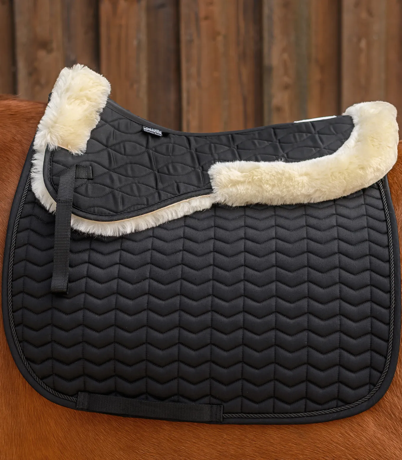 Lammfell Sattelkissen
